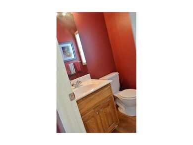 Half bathroom off kitchen.