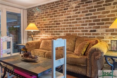 Bright, airy family room with glass sliders that l