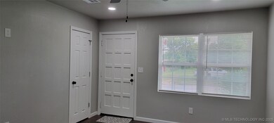 Entry closet in living room.