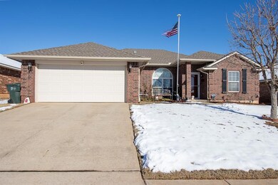 Single story home with a garage