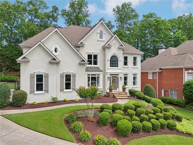 Impressive Curb Appeal with lush landscaping and w