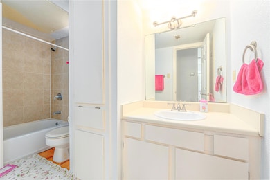 Bathroom featuring vanity and bathing tub / showe