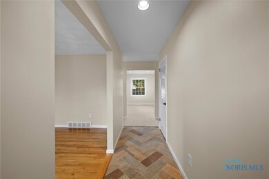 Tile foyer floor in herringbone pattern, guest clo