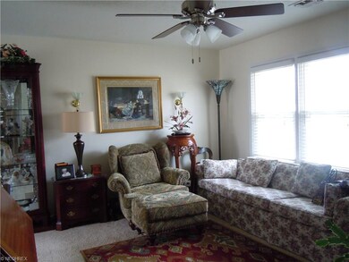 Living Room. Windows with blinds.