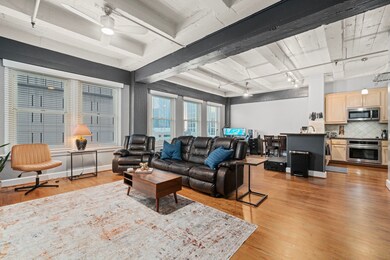 Alternate view of living looking towards dining (c