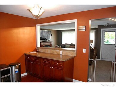 Kitchen. Breakfast bar and added prep space. Opens