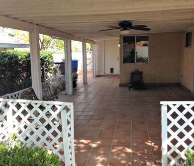Covered patio with plenty of space to BBQ and loun