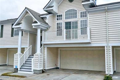 Full two car garage with additional storage.