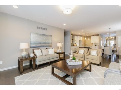 Great Room With Hardwood Flooring