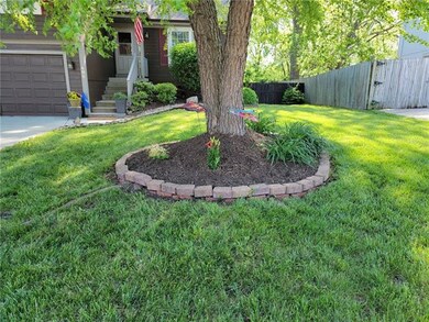 406 S Huntsman Blvd, Raymore, MO 64083 - photo 2