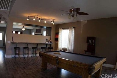 GAMEROOM OR LIVING AND DINING ROOM