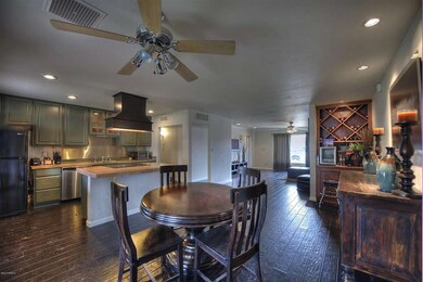 Kitchen dining area w built-in wine rack