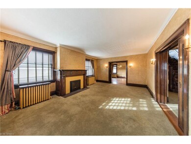 Living Room with 5' pocket door leading into forma