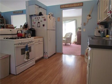 The kitchen has been opened up to the dining room.