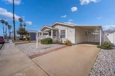 View of the home including the carport.