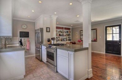 Remodeled kitchen open to dining area and living r