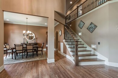 Exceptional architectural elements, 7 inch baseboards, crown molding, Three Fireplaces, 10 Foot Ceilings throughout, Open and flowing rooms ideal for entertaining. 