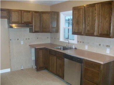 All new kitchen cabinets, tiled floor, stainless d