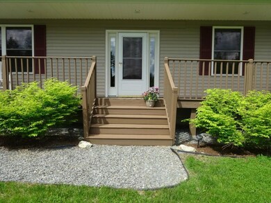 Classic covered farmer's porch is a...