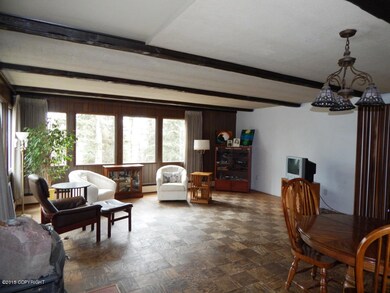 Living Room With Wall Of Windows
