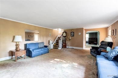 The charming banister leads to the second floor. T