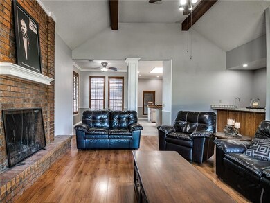 Living room with view of dining room, kitchen & we