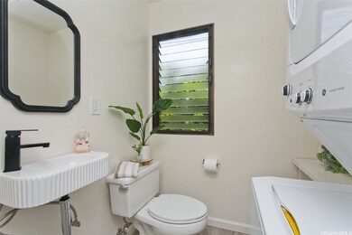 Downstairs half bath & laundry area