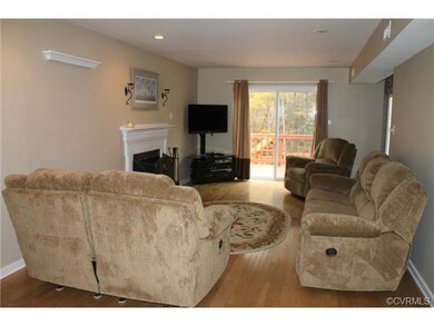 LARGE GREAT ROOM WITH WOOD-BURNING FIREPLACE AND D
