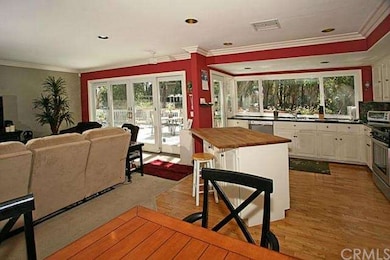 Kitchen open to dining area, living room and onto 