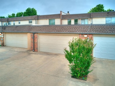 View of front of property featuring brick siding