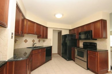 ALL BLACK APPLIANCES AND CERAMIC FLOORS