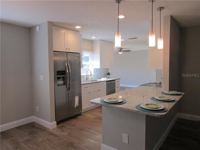 Dining room view to the kitchen and family room in