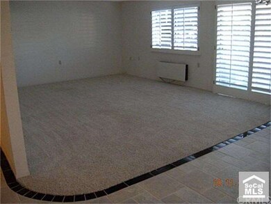 Spacious Living room. Plantation Shutters