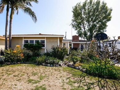 Front view of home with landscape visual.