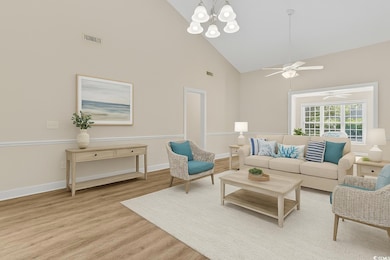 Living room featuring high vaulted ceiling, visibl