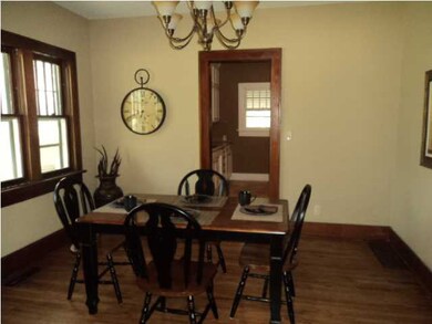 Magnificent Formal Dining Room with Refinished Har