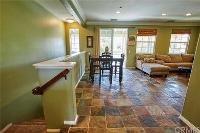 Stairs on left leading from downstairs entry and 2
