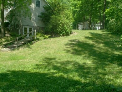 Basement Walkout to The Patio And Woods