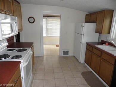 Another view of the kitchen showing adjacent break