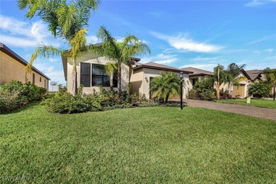 Single story home featuring a front lawn, stucco s