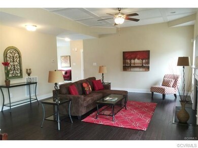 Spacious Family Room with ceiling treatment and ce
