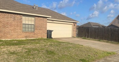 Garage with a lawn