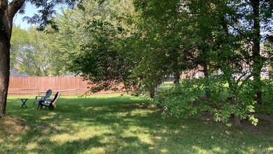And behind the home is a good-sized yard, fenced for dogs at the present time.