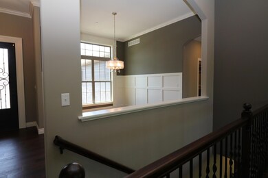 Living/stairs to dining/entry
