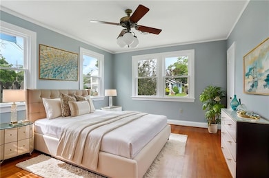 This light filled bedroom has been virtually stage