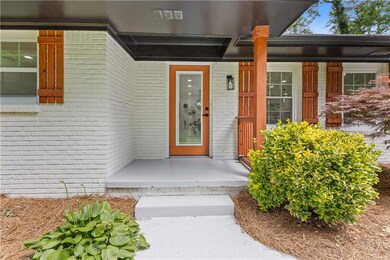 Entrance to property with brick siding