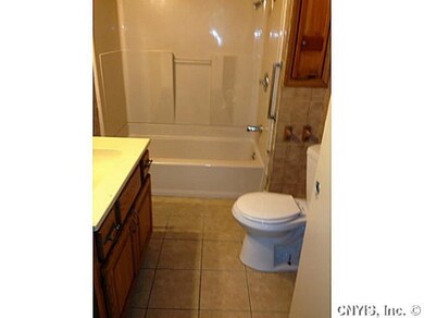 Bathroom Features new toilet and new ceramic tiles