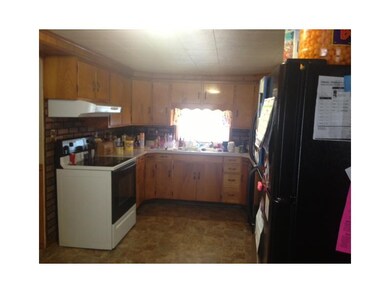 Kitchen. Country casual kitchen with solid maple c