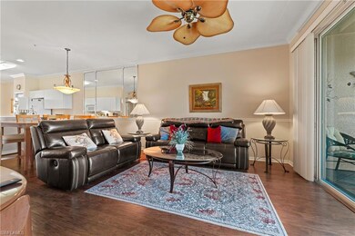 Living room with dark hardwood / wood-style floors