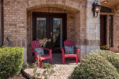 This covered front porch is the perfect place to s